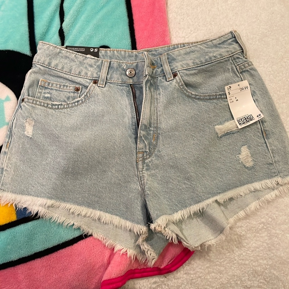 Brand new with tags H&M divided denim distressed shorts. Size 6 women’s